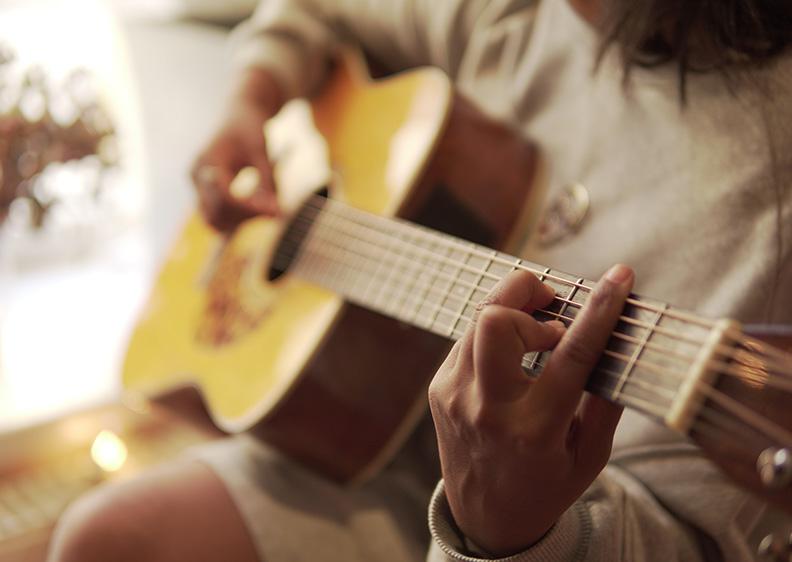 Girl Playing Guitar